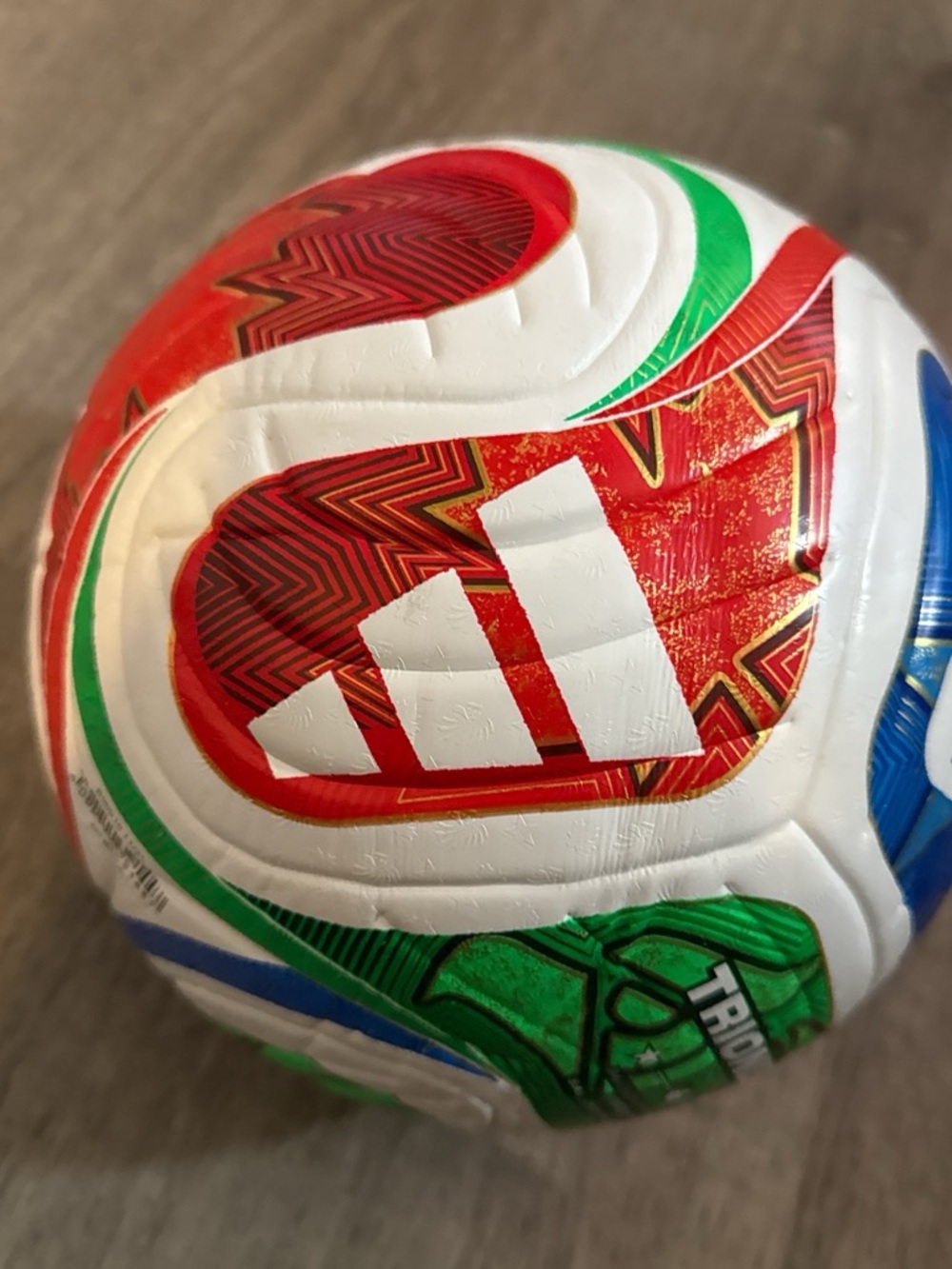 adidas White Soccer Ball with Red, Green & Blue Accents